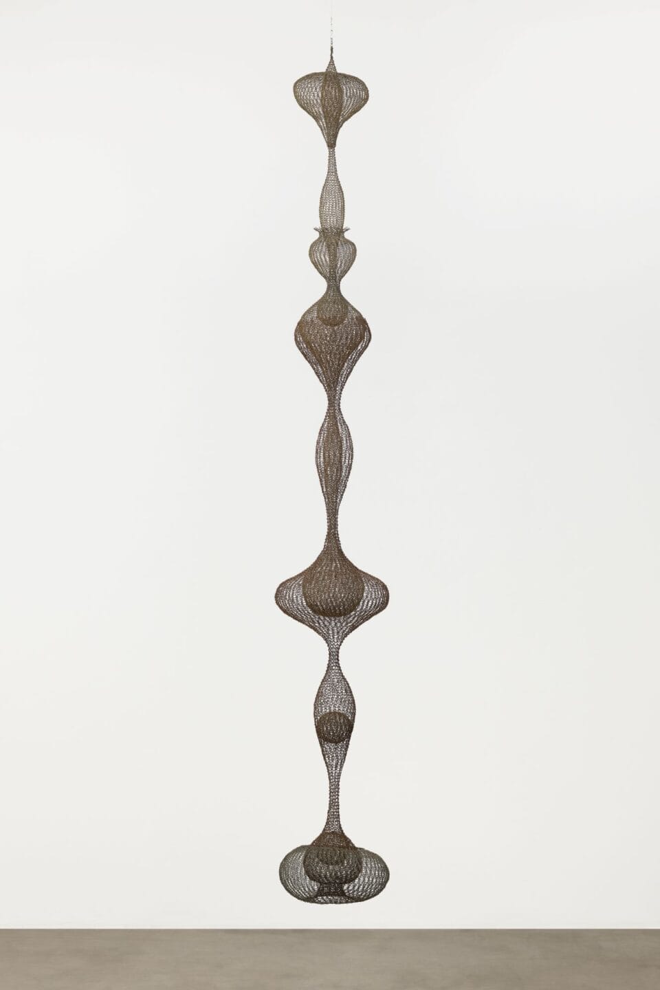 a long, hanging wiry bulbous sculpture by Ruth Asawa